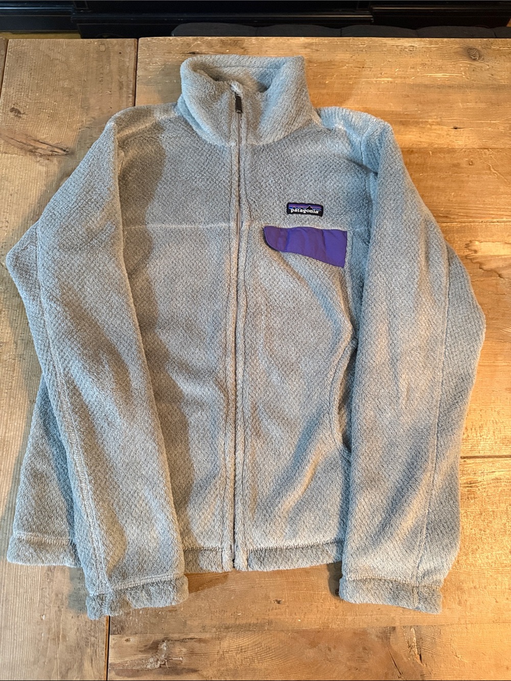 Patagonia Kids Light Blue Fleece Jacket with Purple Pocket Accent